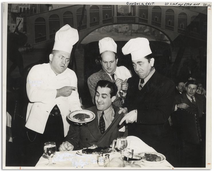 Moe Howard Personally Owned 10'' x 8'' Glossy Photo Circa 1939 -- With Label on Verso Reading ''The Stooges making like Stooges'' at Gondola Restaurant in Brooklyn -- Very Good Condition